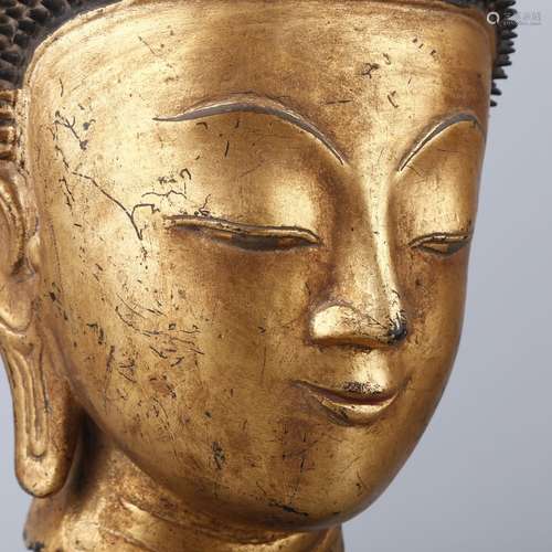 A GILT-BRONZE OF AMITABHA HEAD