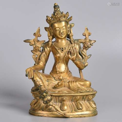 A GILT-BRONZE FIGURE OF TARA