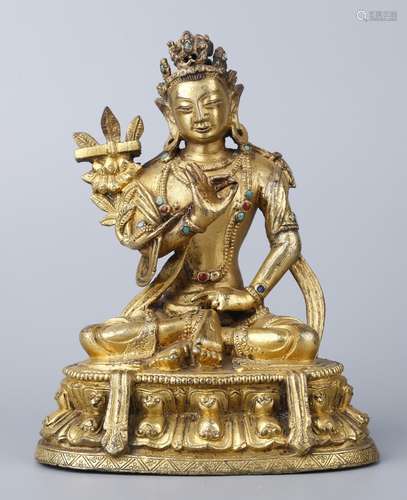 A GILT-BRONZE FIGURE OF MAITREYA