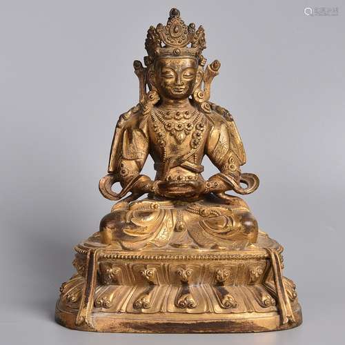 A GILT-BRONZE FIGURE OF BODHISATTVA