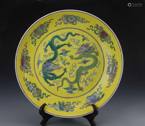 A SANCAI GALZED 'DRAGON' CHARGER, KANGXI MARK