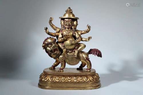 A GILT-BRONZE FIGURE OF MAHAKALA