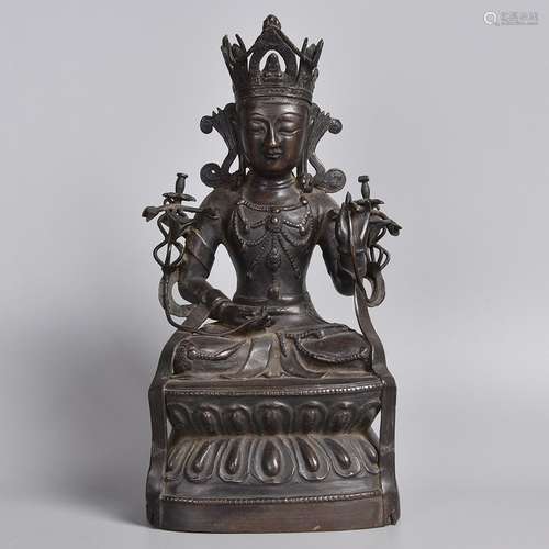 A BRONZE FIGURE OF SEATED GUANYIN