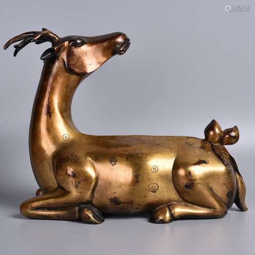 A GILT-BRONZE FIGURE OF DEER