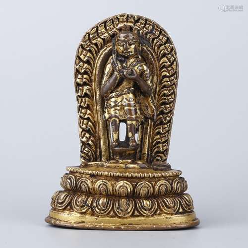 A GILT-BRONZE FIGURE OF BUDDHA