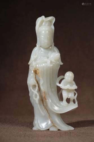 A JADE CARVING FIGURE OF GUANYIN AND A CHILD