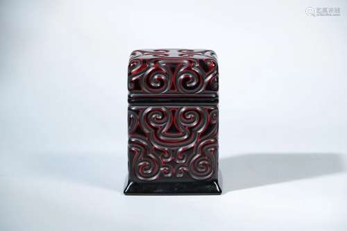 A RED LACQURE CARVED SQUARE BOX AND COVER