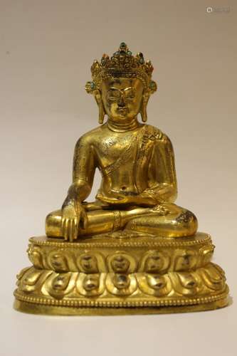 A GILT-BRONZE FIGUR OF MAITREYA