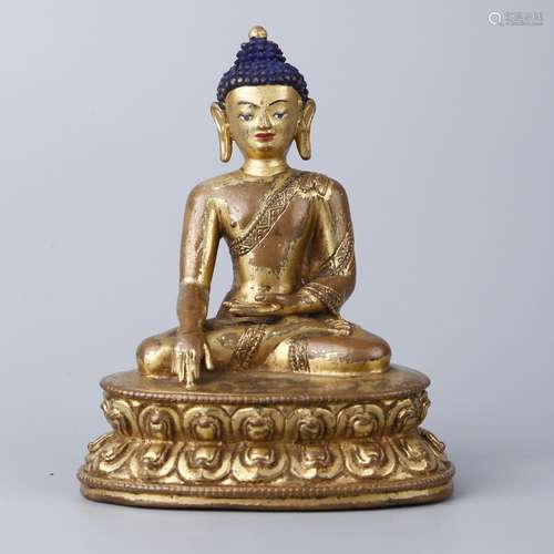 A GILT-BRONZE FIGURE OF SHAKYAMUNI