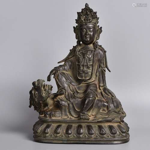 A BRONZE FIGURE OF BUDDHA