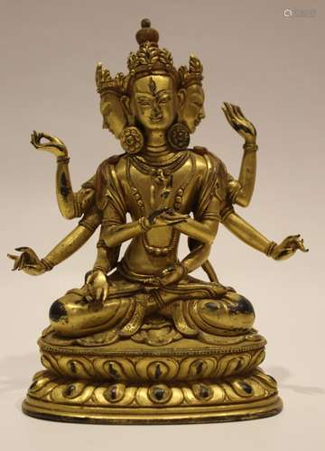 A GILT-BRONZE FIGURE OF USHRISHAVJAYA