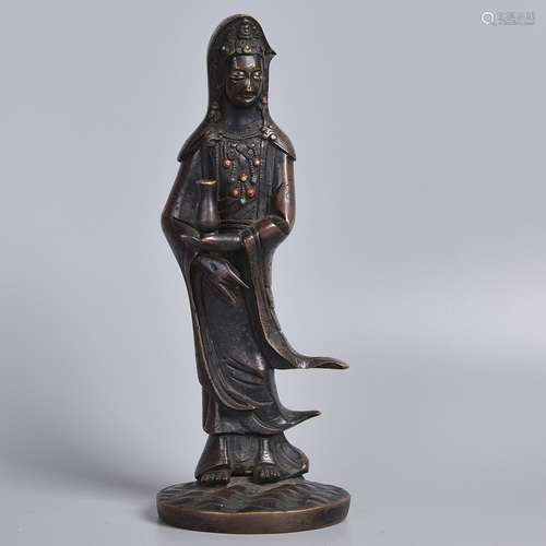 A BRONZE FIGURE OF GUANYIN