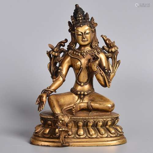 A GILT-BRONZE FIGURE OF TARA