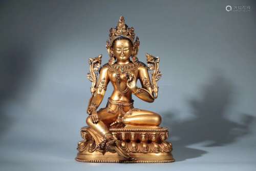 A GILT-BRONZE FIGURE OF TARA