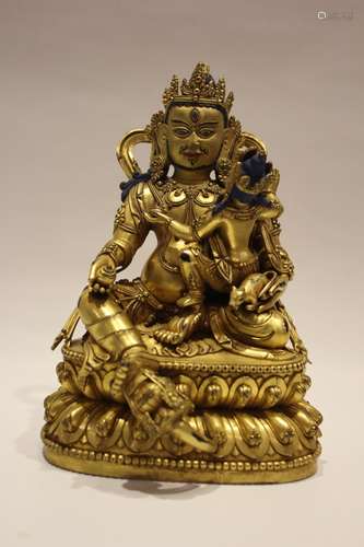 A GILT-BRONZE FIGURE OF TARA