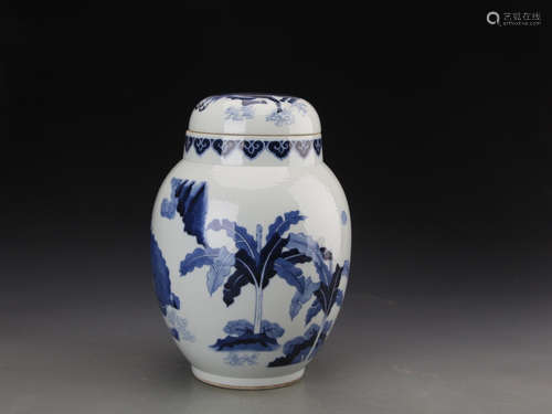 A BLUE AND WHITE JAR AND COVER