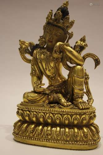 A GILT-BRONZE FIGURE OF TARA