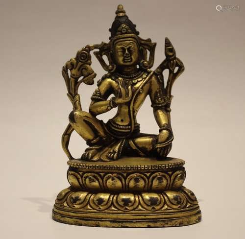 A GILT-BRONZE FIGURE OF TARA