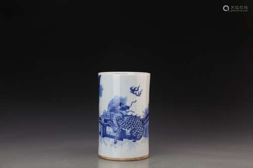 A BLUE AND WHITE BRUSH POT