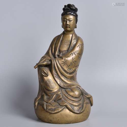 A GILT-BRONZE FIGURE OF GUANYIN