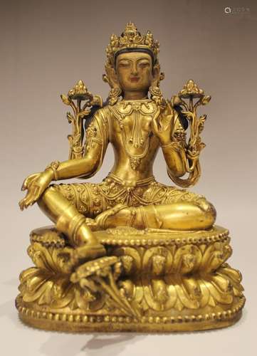 A GILT-BRONZE FIGURE OF TARA