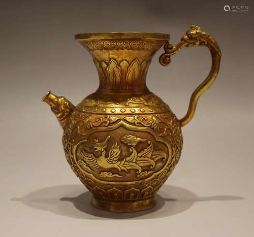 A GILT-BRONZE CARVED EWER