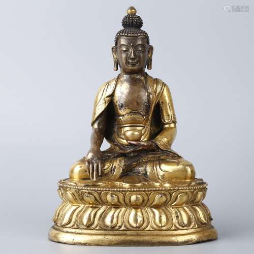 A GILT-BRONZE FIGURE OF BUDDHA