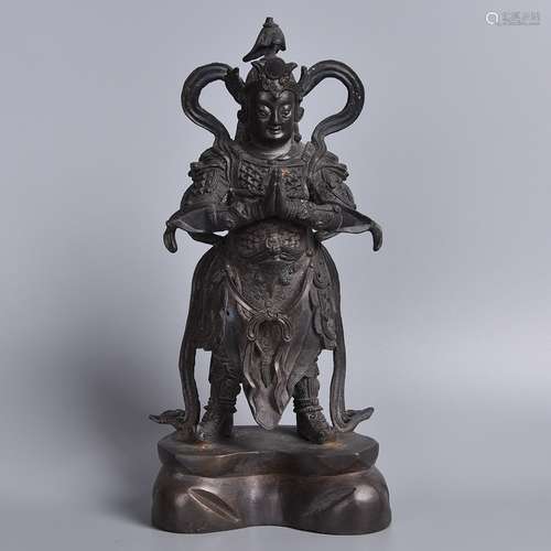 A BRONZE FIGURE OF WEITUO