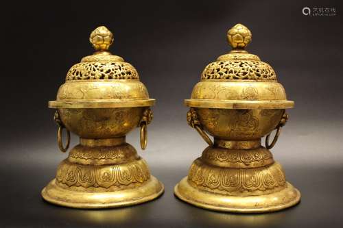 A PAIR OF GOLT-BRONZE CENSER BURNERS