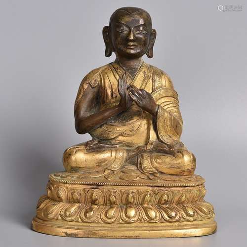 A GILT-BRONZE FIGURE OF BUDDHA