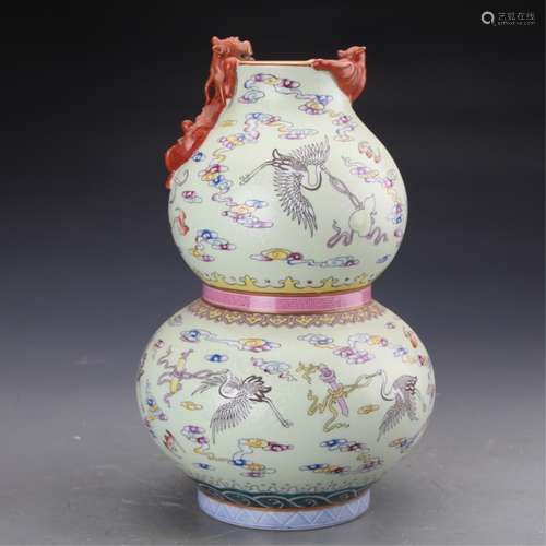 A FAMILLE ROSE DOUBLE GOURD VASE, QIANLOG MARK