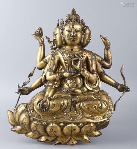 A GILT-BRONZE FIGURE OF USHNISHAVJAYA