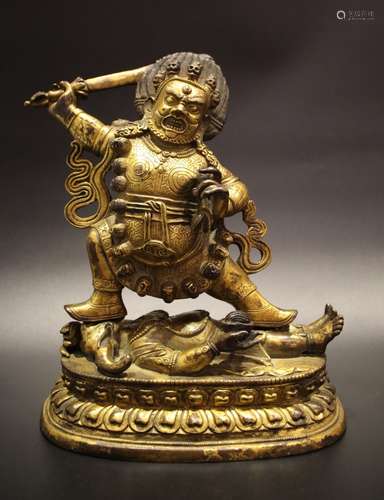 A GILT-BRONZE FIGURE OF MAHAKALA