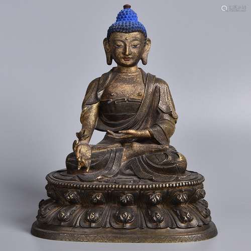 A GILT-BRONZE FIGURE OF SHAKYAMUNI