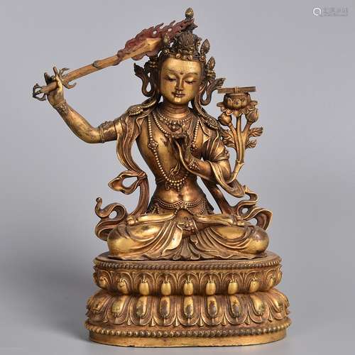 A GILT-BRONZE BODHISATTVA