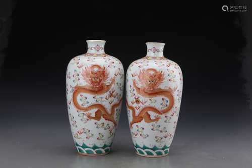 A PAIR OF COPPER-RED 'DRAGON' VASES, QIANLONG MARK