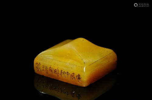 A FIELD YELLOW STONE SQUARE SEAL