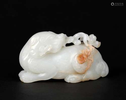 A WHITE JADE FIGURE OF A MYTHICAL BEAST, QING DYNASTY