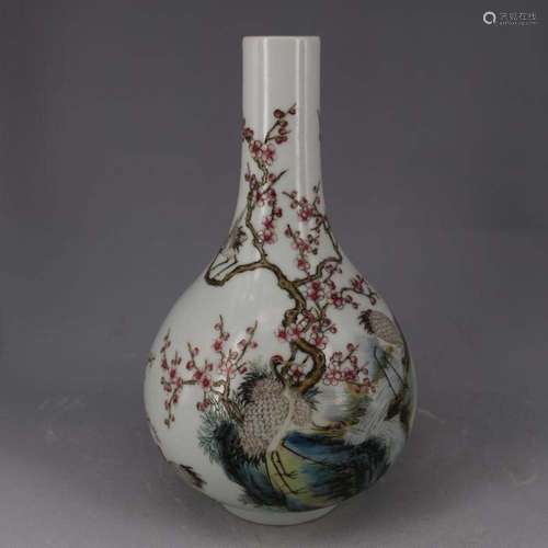 A FAMILLE ROSE 'BIRDS AND FLOWER' BOTTLE VASE, QIANLONG MARK, QING DYNASTY