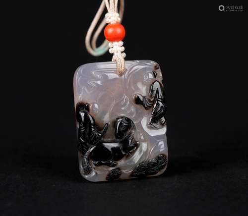 AN AGATE PENDANT, QING DYNASTY