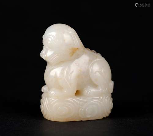 A WHITE JADE FIGURE OF A LION, QING DYNASTY