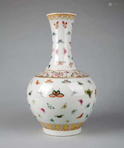 A FAMILLE ROSE 'HUNDRED BUTTERFLIES' BOTTLE VASE, GUANGXU MARK, QING DYNASTY