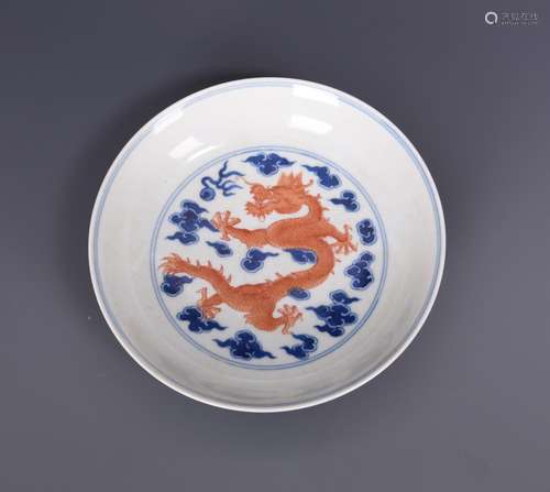 A BLUE AND WHITE AND IRON RED 'DRAGONS' DISH, 'YANG HE TANG' MARK, QING DYNADSTY