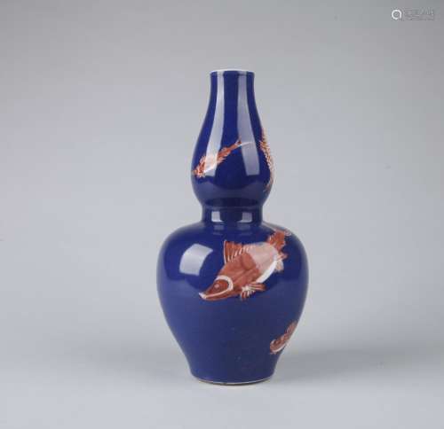 AN IRON-RED-DECORATED BLUE GROUND DOUBLE-GOURD-SHAPED VASE, KANGXI MARK, QING DYNASTY