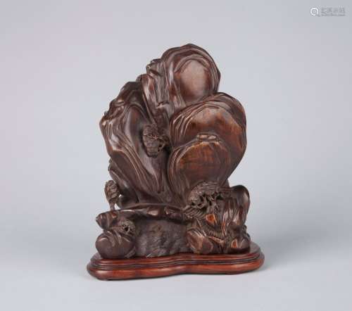 A CARVED ALOESWOOD BOULDER, QING DYNASTY