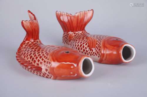 A PAIR IRON RED FISH-SHAPED WALL VASES, QING DYNASTY