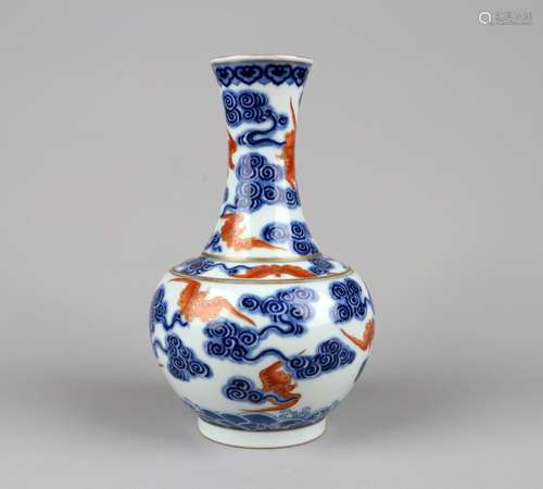 AN IRON-RED-DECORATED BLUE AND WHITE VASE, XUANTONG MARK, QING DYNASTY