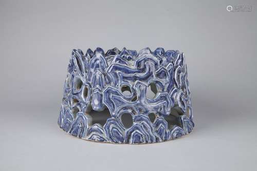 A BLUE AND WHITE MOUNTAIN-FORM STAND, 15TH CENTURY