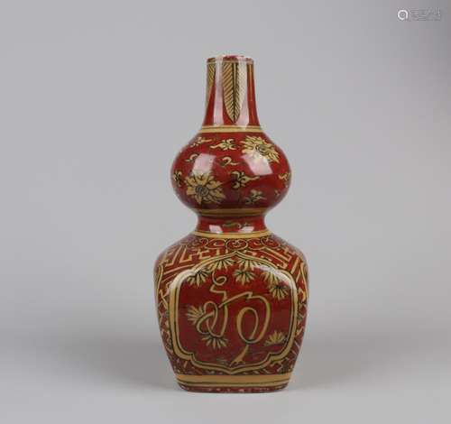 A YELLOW-DECORATED RED GROUND DOUBLE-GOURD-SHAPED VASE, JIAJING MARK, MING DYNASTY