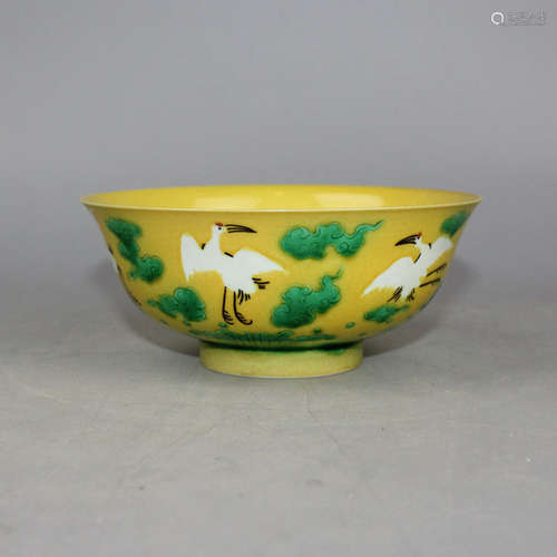 A INCISED YELLOW GROUND 'CRANES' BOWL, KANGXI MARK, QING DYNASTY